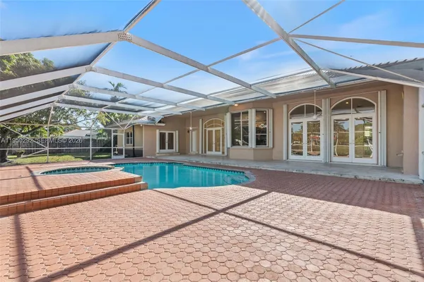 a view of a house with a swimming pool
