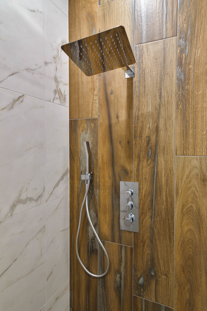 3013 North Normandy Avenue Chicago, IL 60634 - Photo 12 of 26 a bathroom with a shower