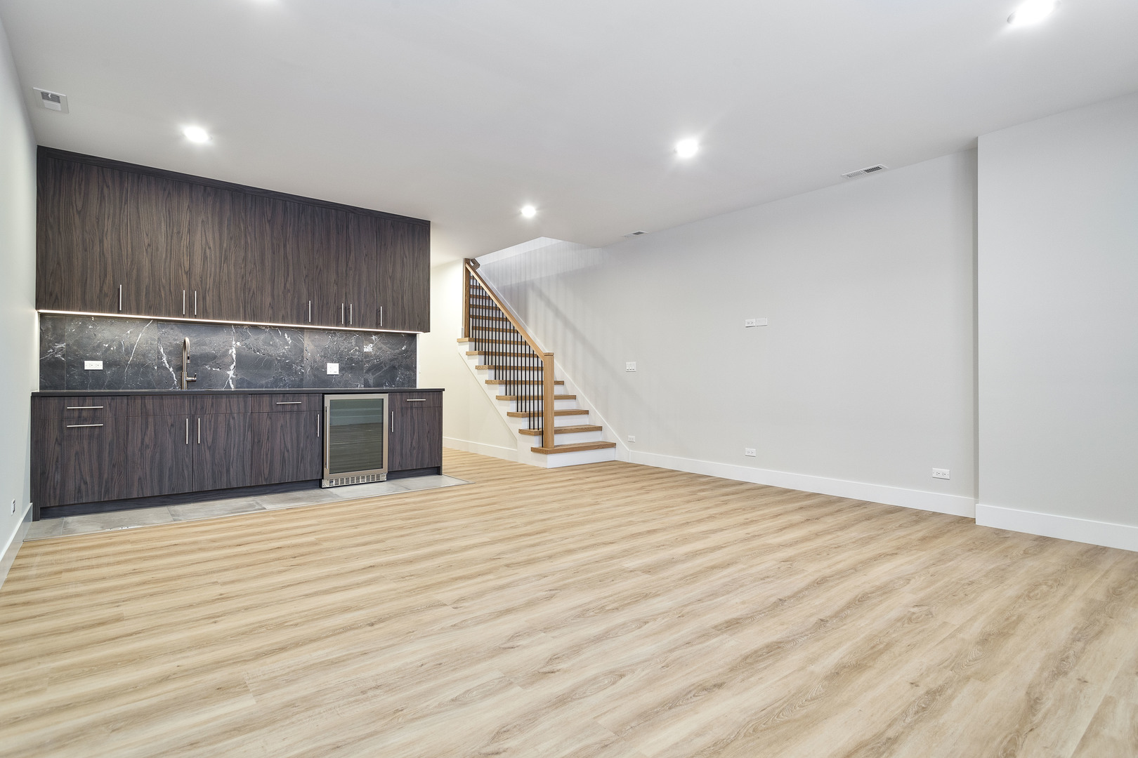 3013 North Normandy Avenue Chicago, IL 60634 - Photo 15 of 26 a view of a room with wooden floor