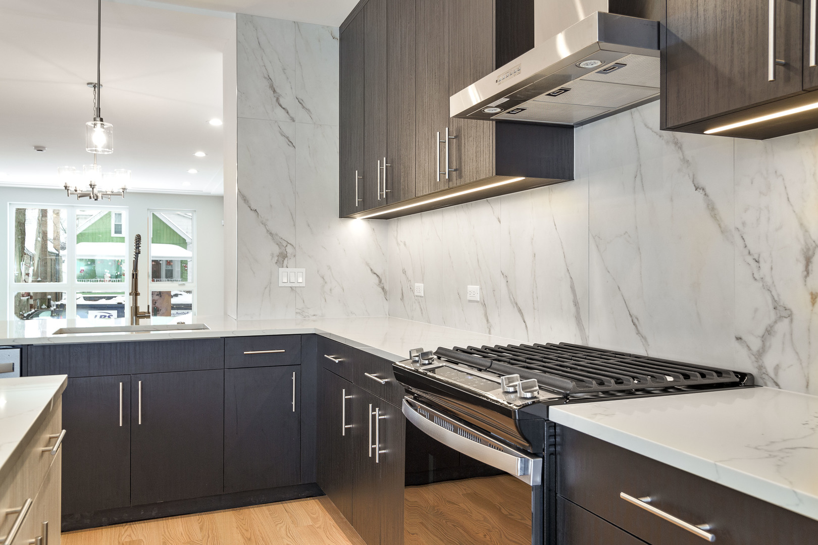 3013 North Normandy Avenue Chicago, IL 60634 - Photo 5 of 26 a kitchen with a stove and a sink