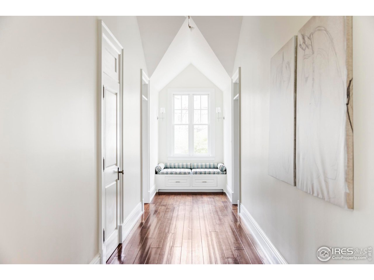 3189 5th Street Boulder, CO 80304 - Photo 13 of 37 a view of a room with wooden floor and windows