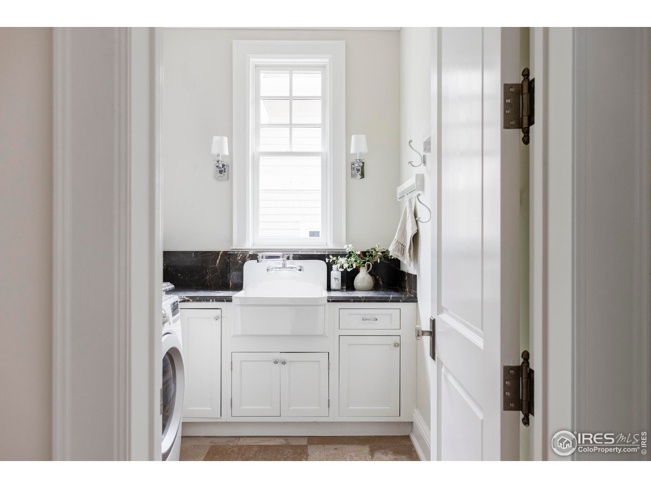 3189 5th Street Boulder, CO 80304 - Photo 26 of 37 a view of a kitchen with washer and dryer