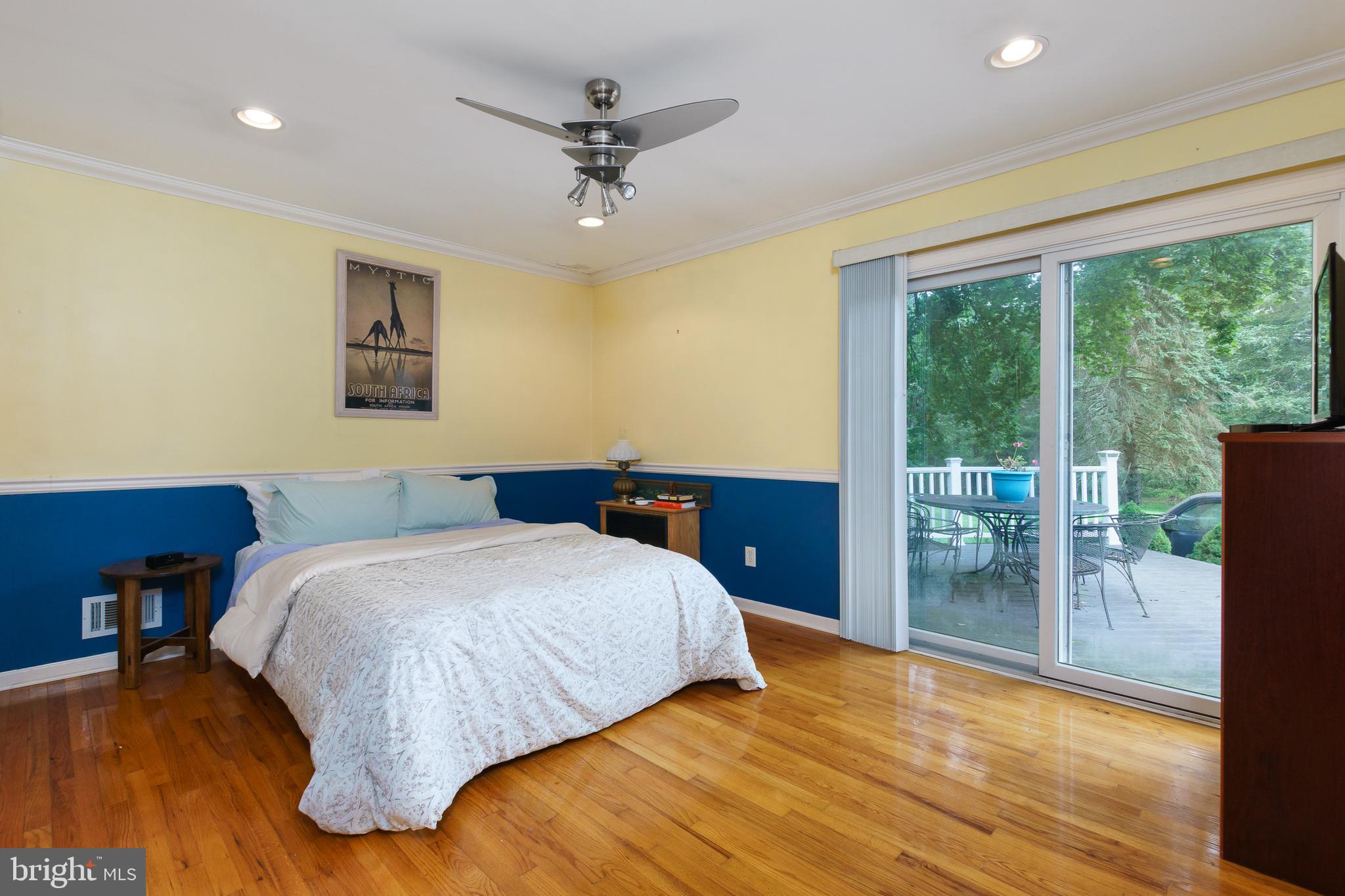 50 Skillman Road Skillman, NJ 08558 - Photo 13 of 31 a bedroom with a large bed and a large window