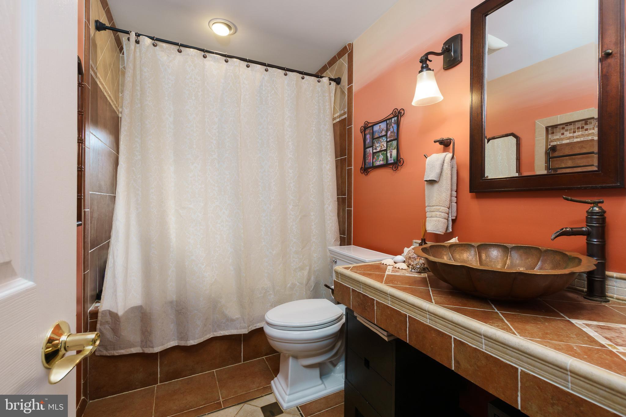 50 Skillman Road Skillman, NJ 08558 - Photo 17 of 31 a bathroom with a sink toilet and shower
