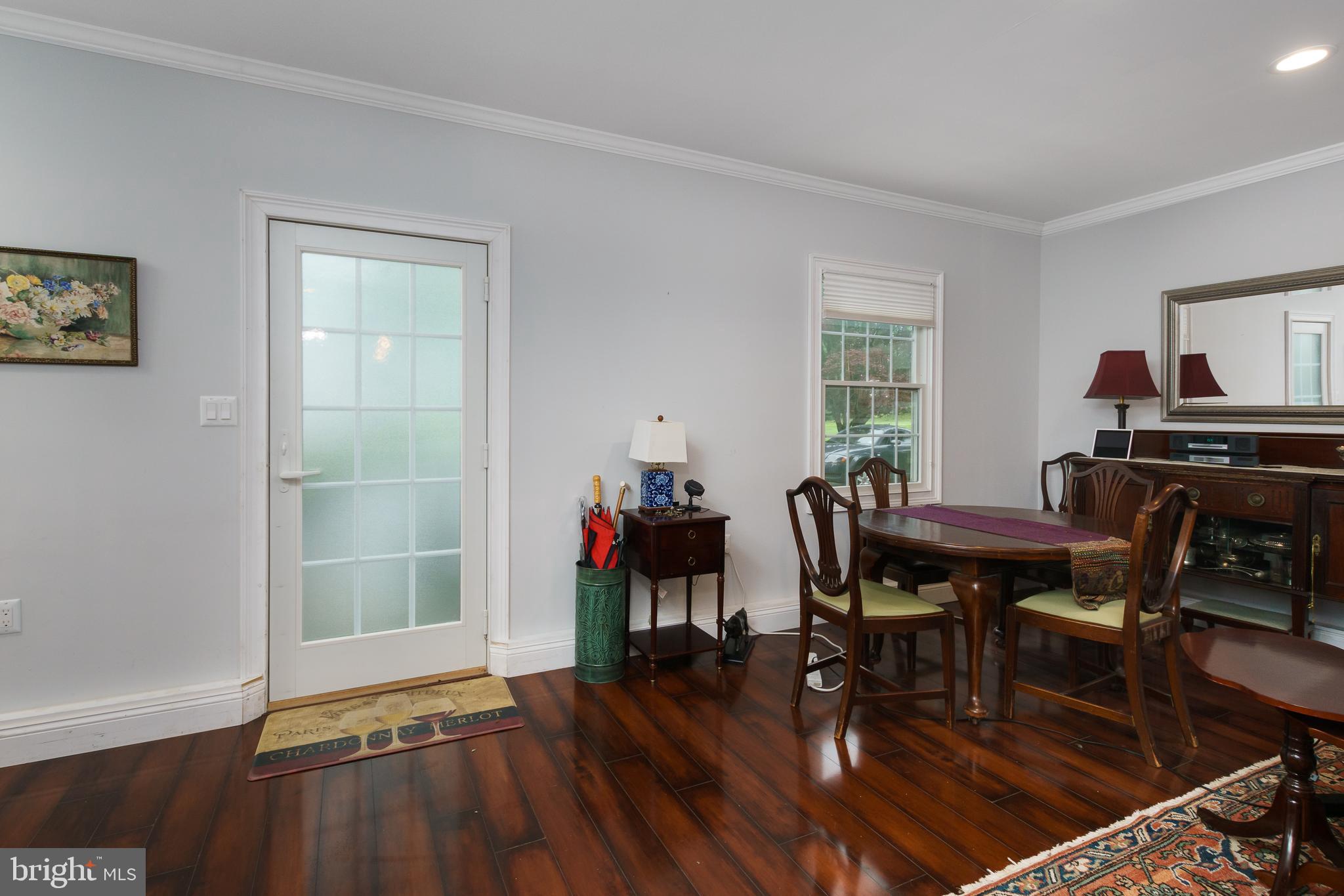 50 Skillman Road Skillman, NJ 08558 - Photo 18 of 31 a view of a dining room with furniture and wooden floor