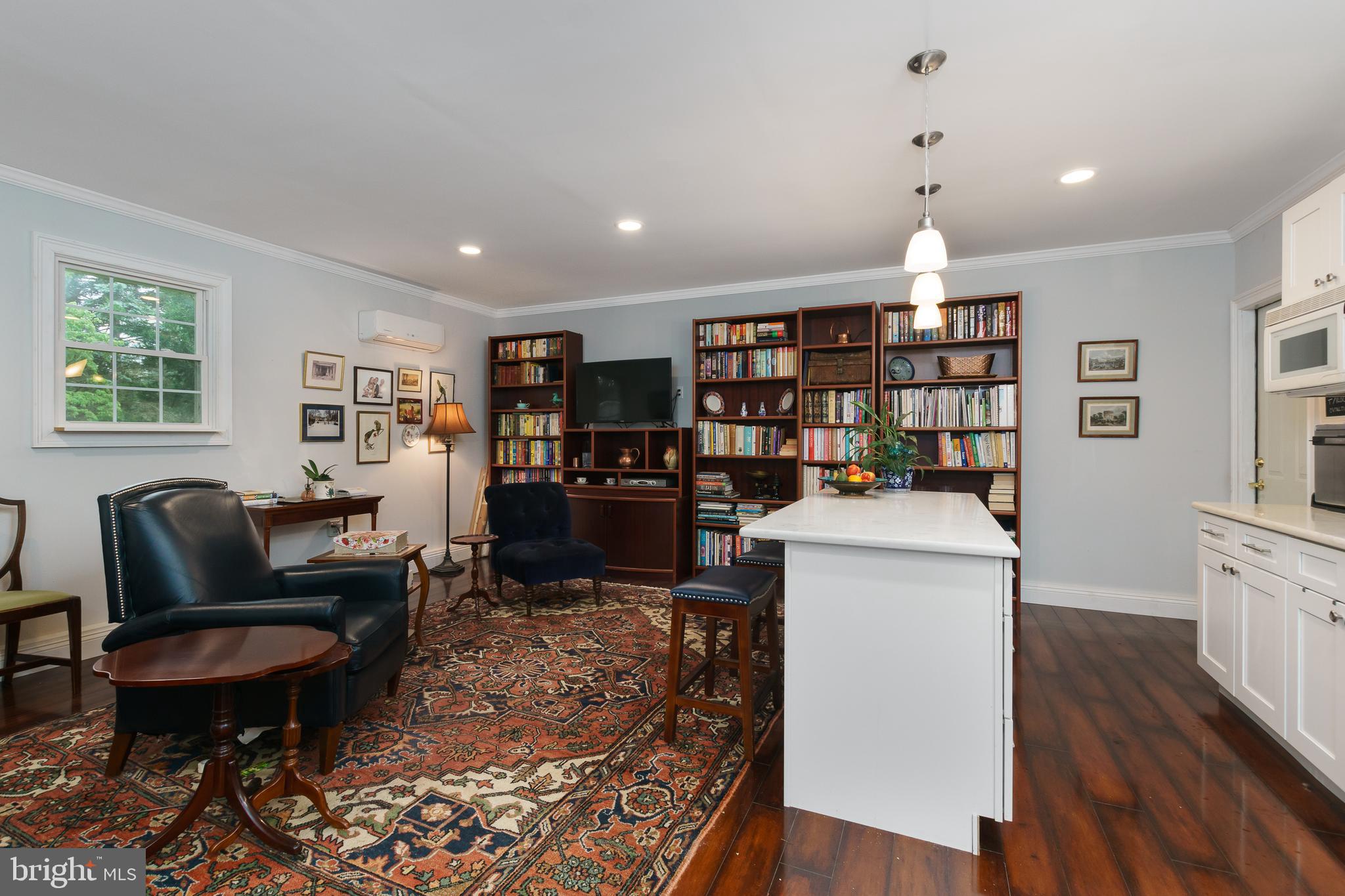 50 Skillman Road Skillman, NJ 08558 - Photo 20 of 31 a living room with furniture and a book shelf