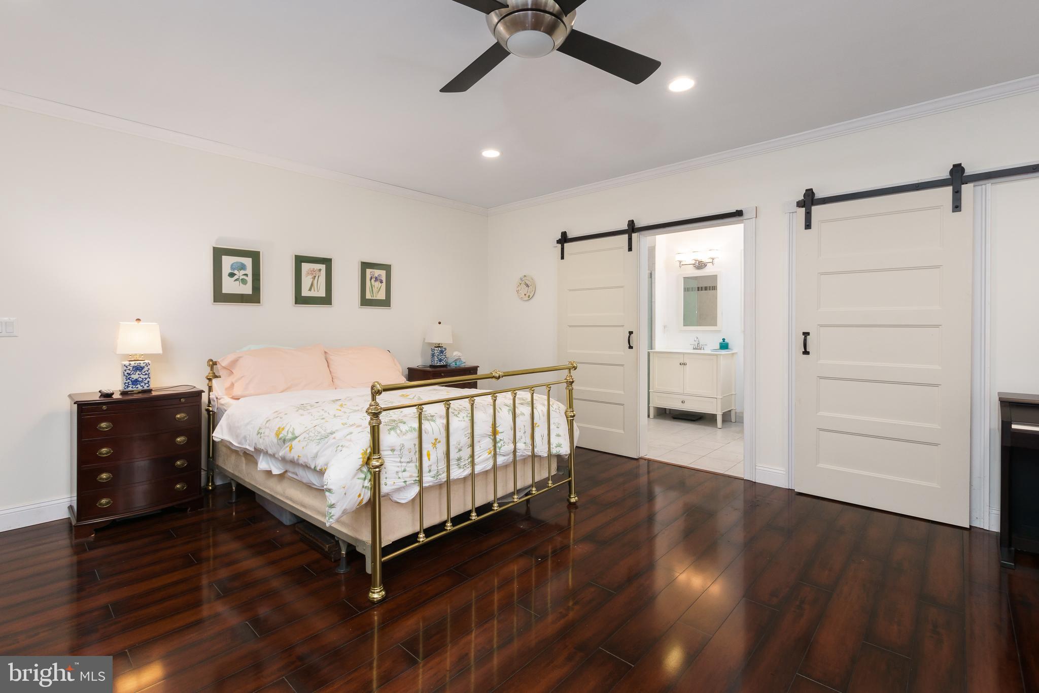 50 Skillman Road Skillman, NJ 08558 - Photo 24 of 31 a bedroom with a bed and wooden floor
