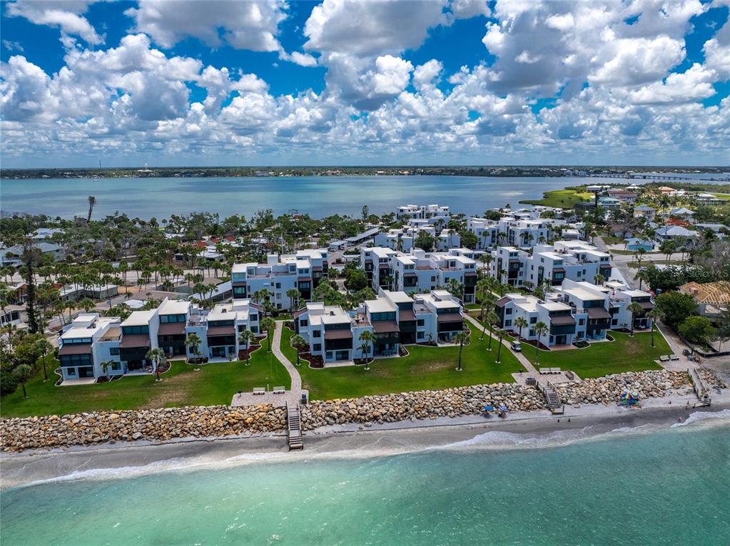 2955 North Beach Road, Unit B614 Englewood, FL 34223 - Photo 55 of 67 a view of a lake with a city