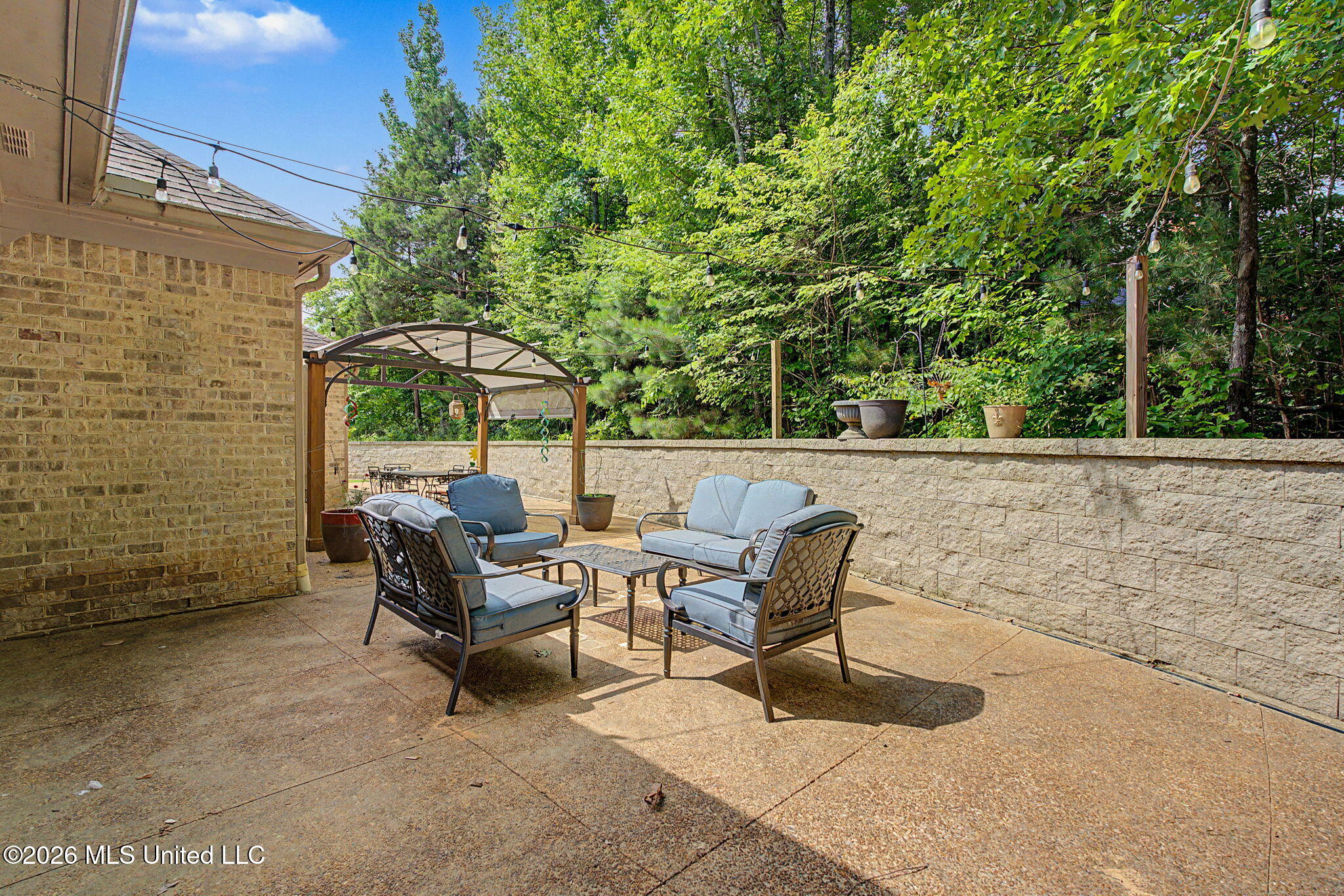 1595 Southern Rdg Trail Olive Branch, MS 38654 - Photo 40 of 48 Extended Patio off Screened Porch