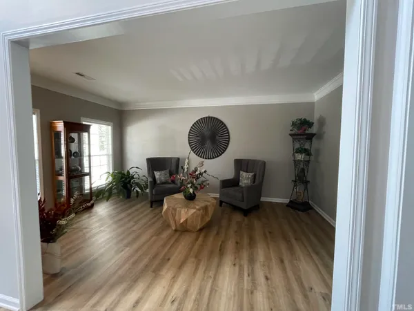 a en suite bathroom with a sink double vanity and a mirror