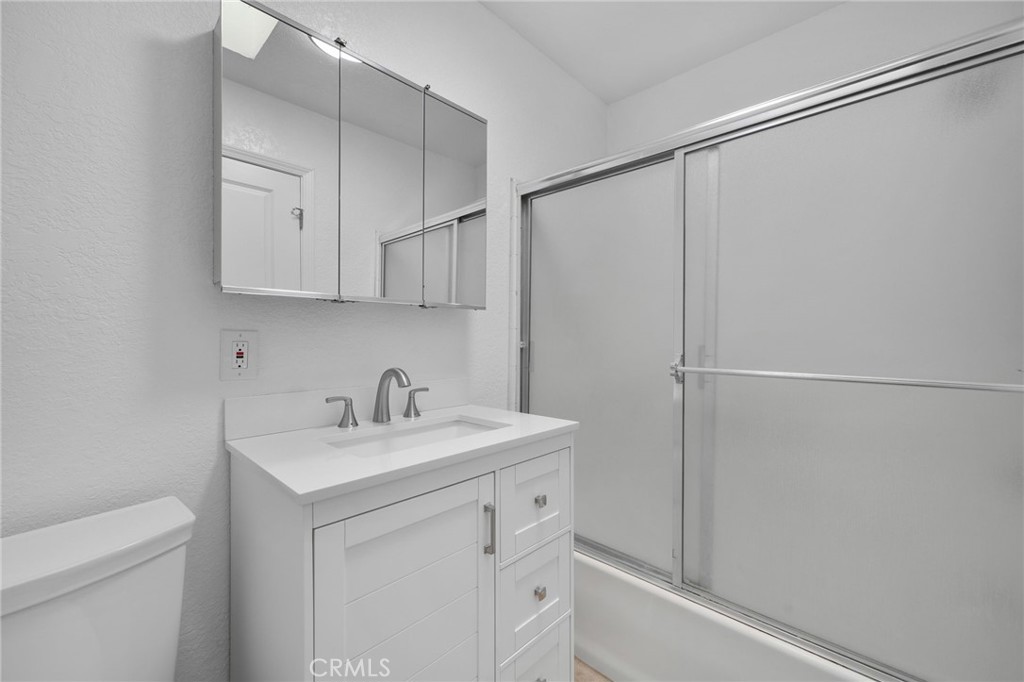 9846 Sunny Vista Road Phelan, CA 92371 - Photo 18 of 34 a bathroom with a sink and a mirror