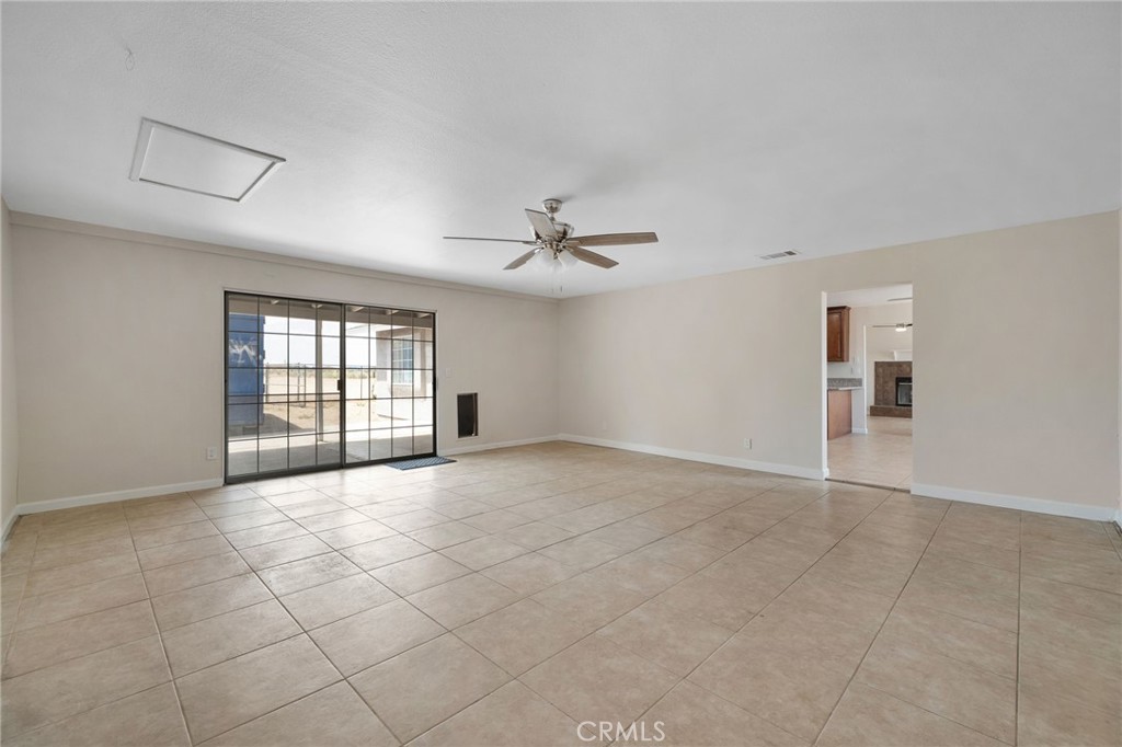 9846 Sunny Vista Road Phelan, CA 92371 - Photo 23 of 34 a view of an empty room with a window
