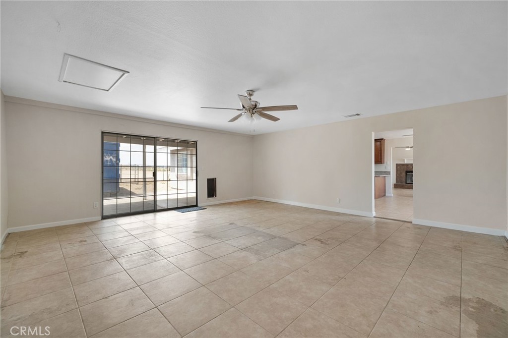 9846 Sunny Vista Road Phelan, CA 92371 - Photo 24 of 34 a view of an empty room with a window
