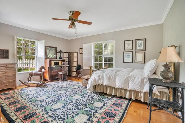 a bed room with bed and window