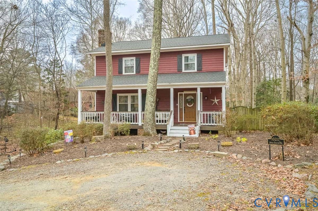 10217 Atlee Station Road Mechanicsville, VA 23116 - Photo 1 of 45 front view of a brick house with a yard