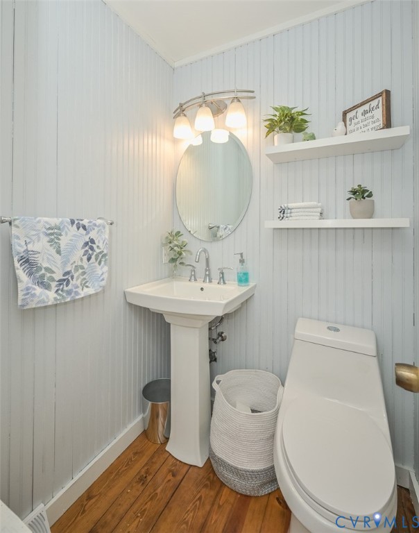 10217 Atlee Station Road Mechanicsville, VA 23116 - Photo 18 of 45 a bathroom with a toilet sink and mirror