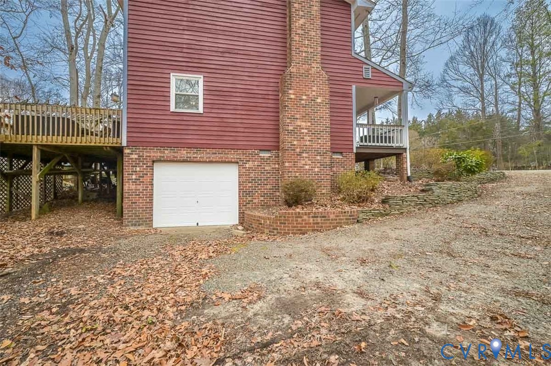 10217 Atlee Station Road Mechanicsville, VA 23116 - Photo 37 of 45 a front view of a house with a yard