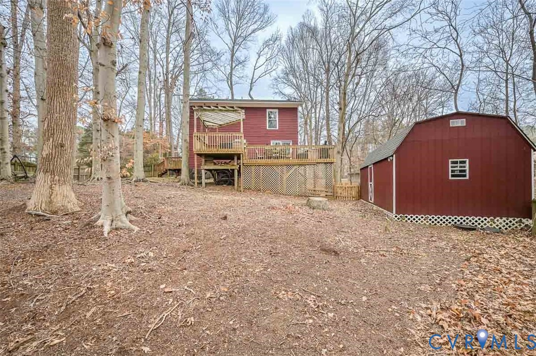 10217 Atlee Station Road Mechanicsville, VA 23116 - Photo 39 of 45 a view of a house with a yard