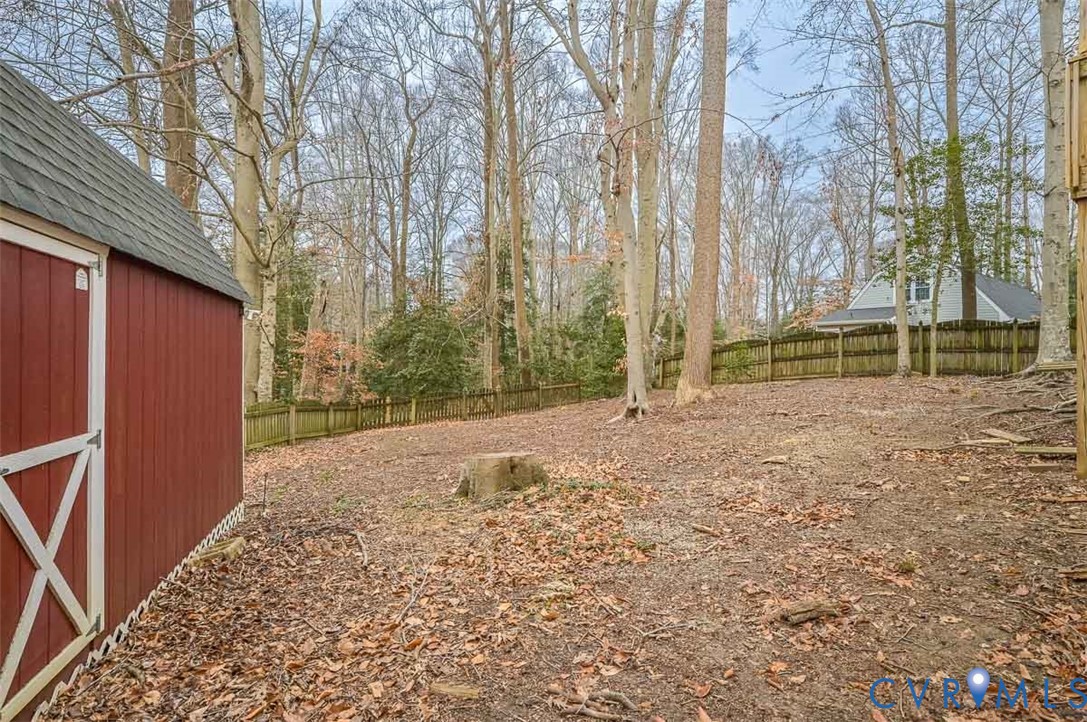 10217 Atlee Station Road Mechanicsville, VA 23116 - Photo 42 of 45 a backyard of a house with large trees