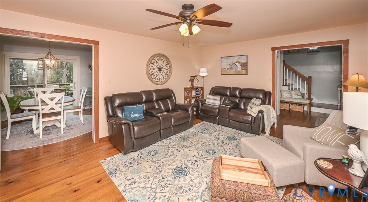 10217 Atlee Station Road Mechanicsville, VA 23116 - Photo 10 of 45 a living room with furniture and wooden floor