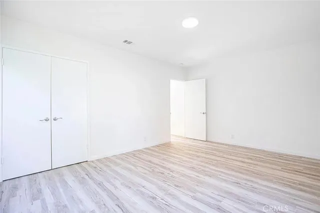 a bathroom with a sink a bathtub and a mirror