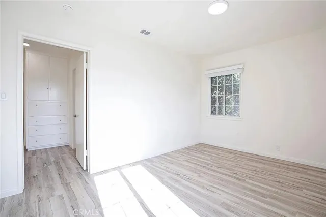 a view of a pathway both side of the house