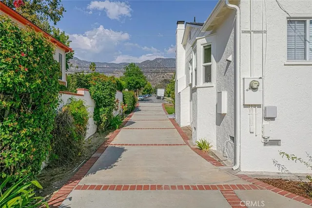 a view of a couches in backyard of house