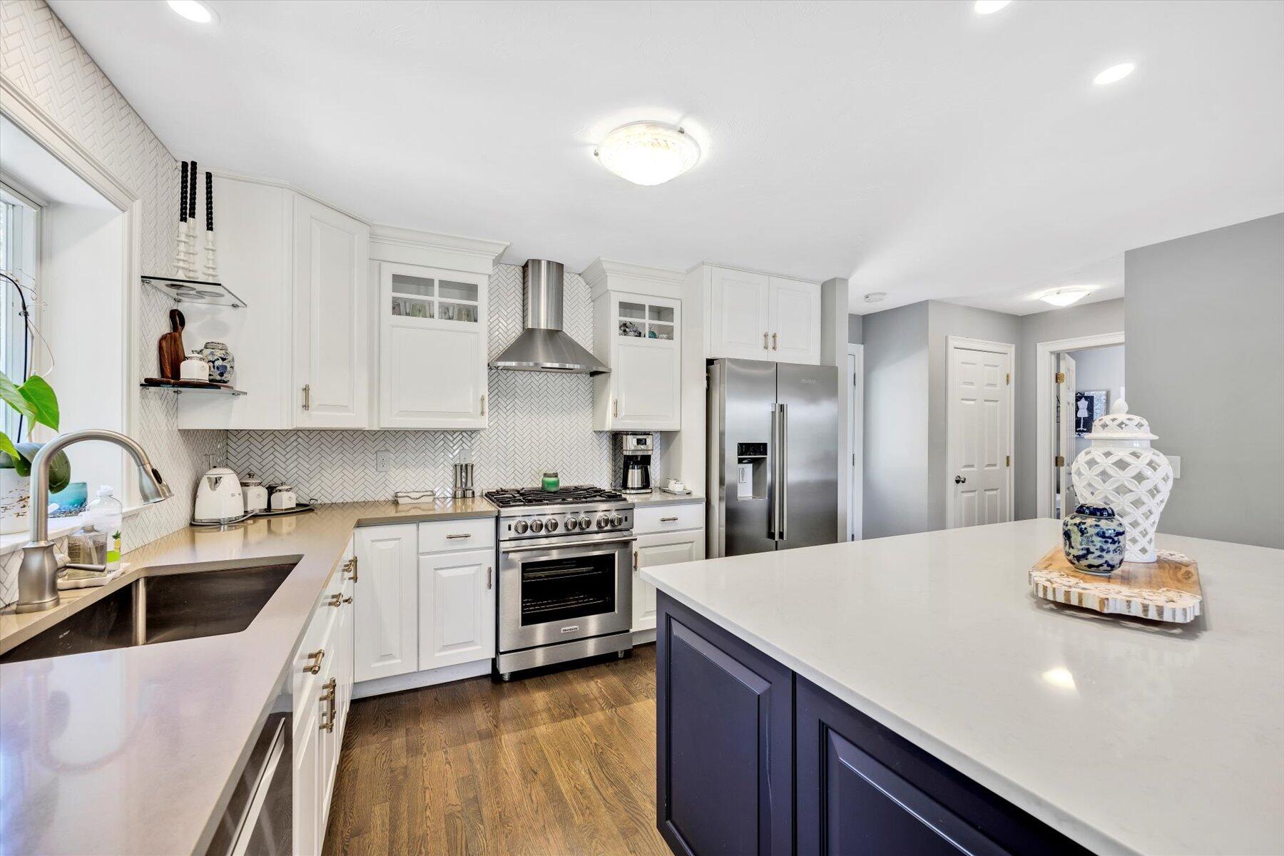 1 Ravens Nest Road Sandwich, MA 02563 - Photo 10 of 46 a kitchen with stainless steel appliances a sink stove and refrigerator