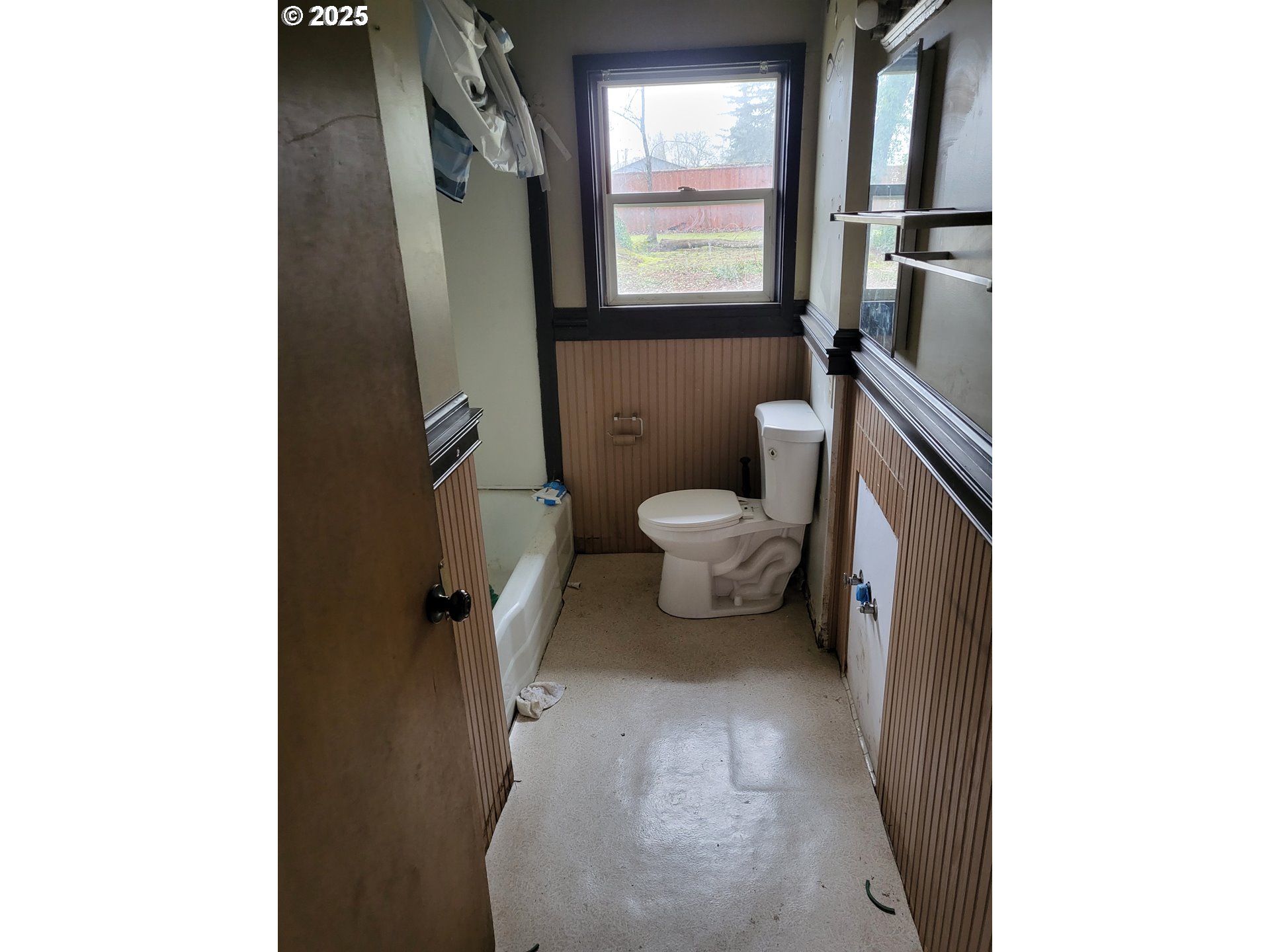 596 Northeast Linden Avenue Gresham, OR 97030 - Photo 12 of 18 a bathroom with a toilet and a shower