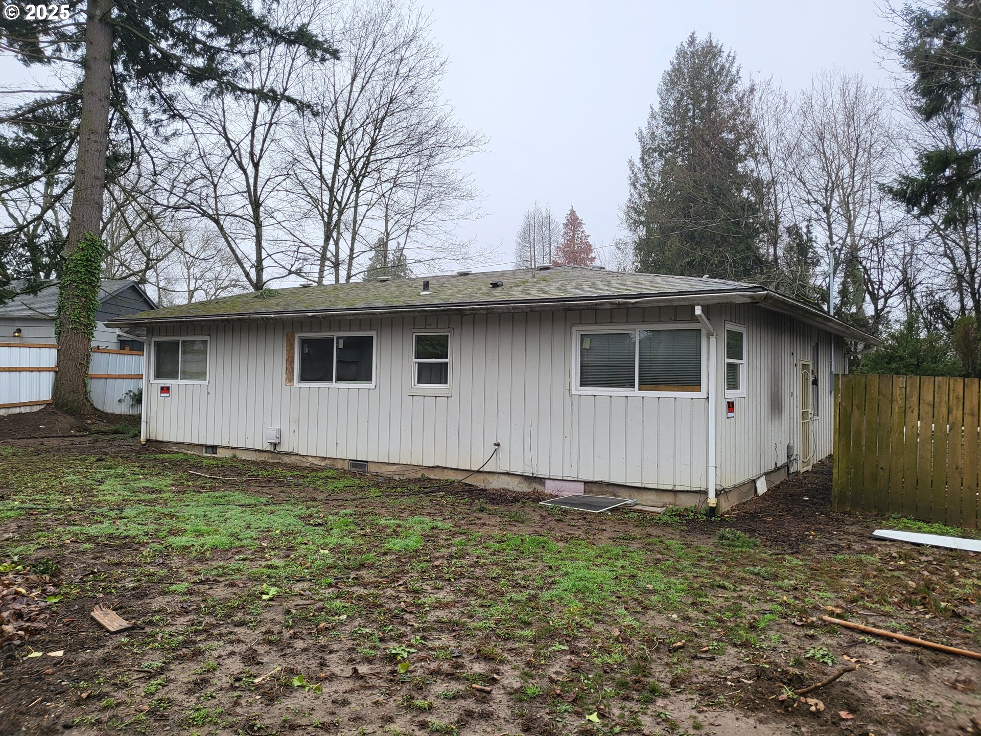 596 Northeast Linden Avenue Gresham, OR 97030 - Photo 15 of 18 a front view of a house with a yard