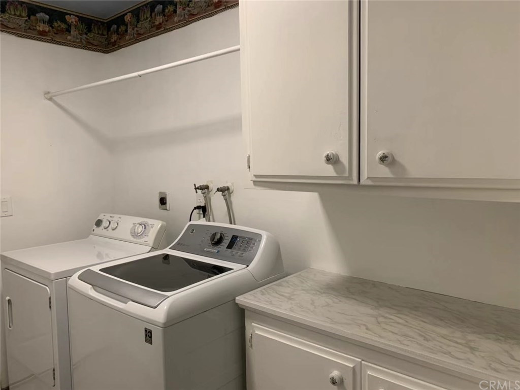 5053 Roundup Road Norco, CA 92860 - Photo 37 of 71 laundry room and cabinets