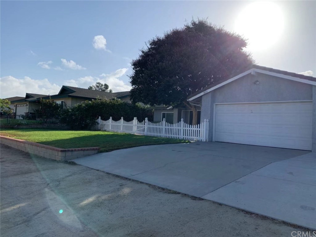 5053 Roundup Road Norco, CA 92860 - Photo 5 of 71 front yard and white fence