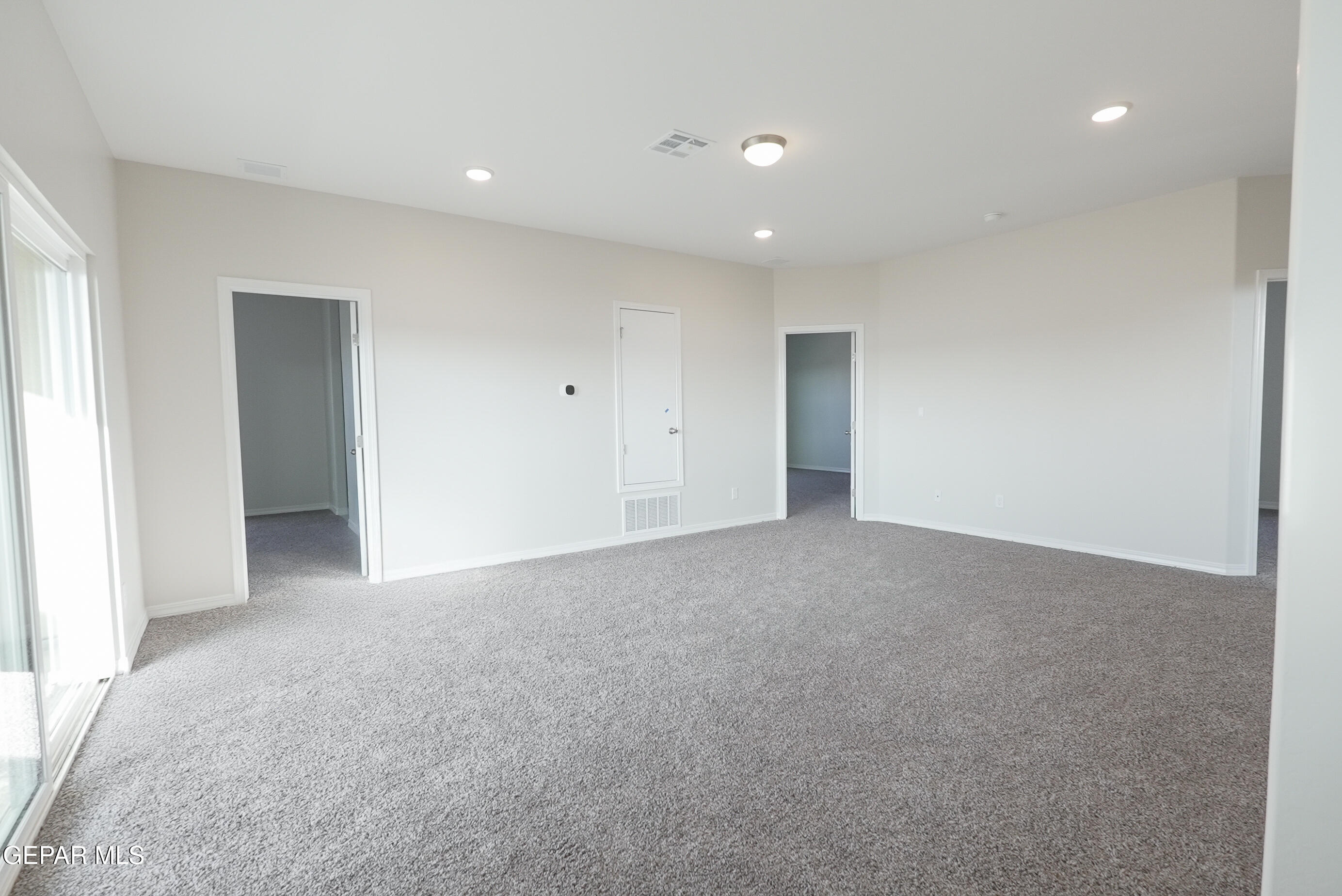 12436 Fill Ball Street El Paso, TX 79928 - Photo 11 of 31 a view of an empty room