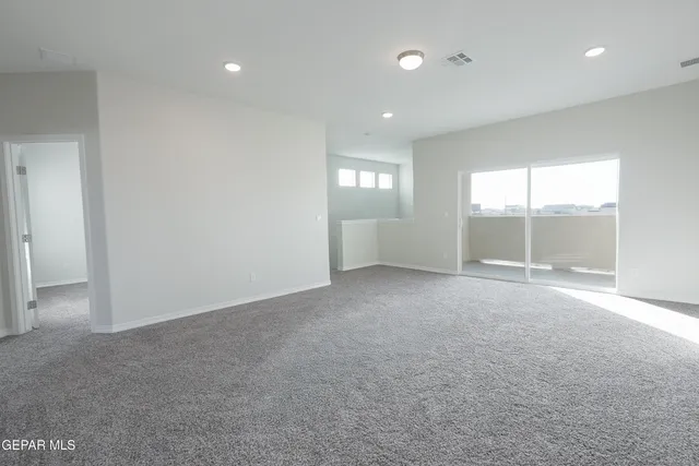 a white toilet and tub sitting next to a bathroom sink