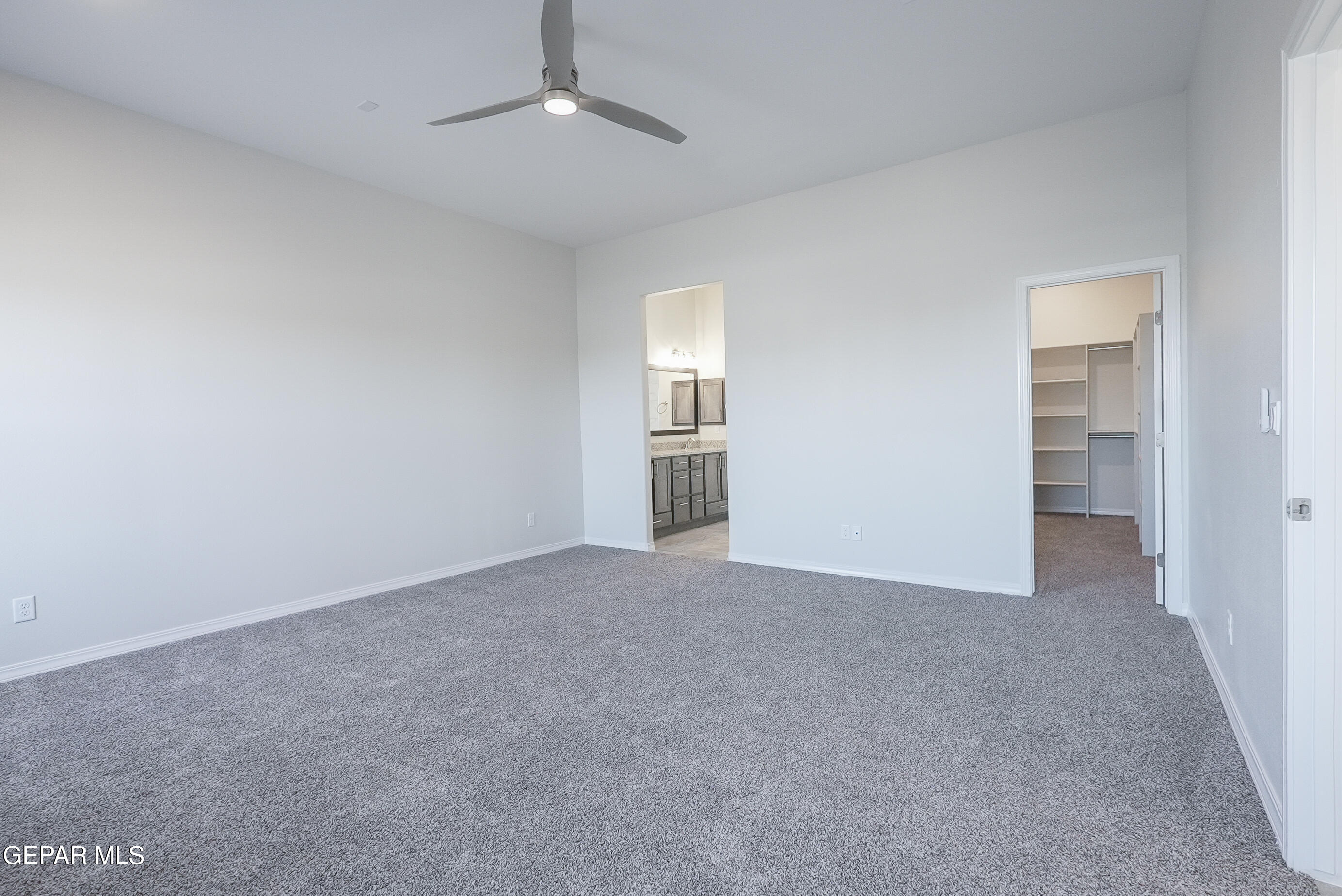12436 Fill Ball Street El Paso, TX 79928 - Photo 25 of 31 a view of an empty room with a window