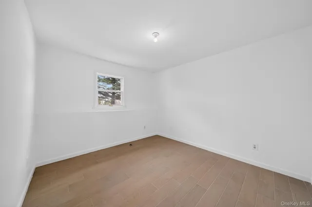 an empty room with a hallway