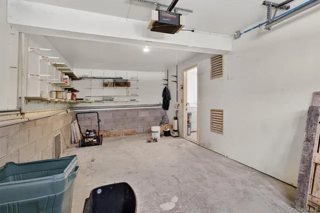 a view of a kitchen with appliances and cabinets
