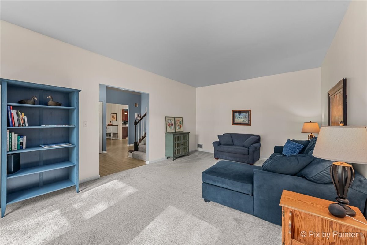 1820 Crofton Drive Algonquin, IL 60102 - Photo 14 of 60 a living room with furniture and a couch