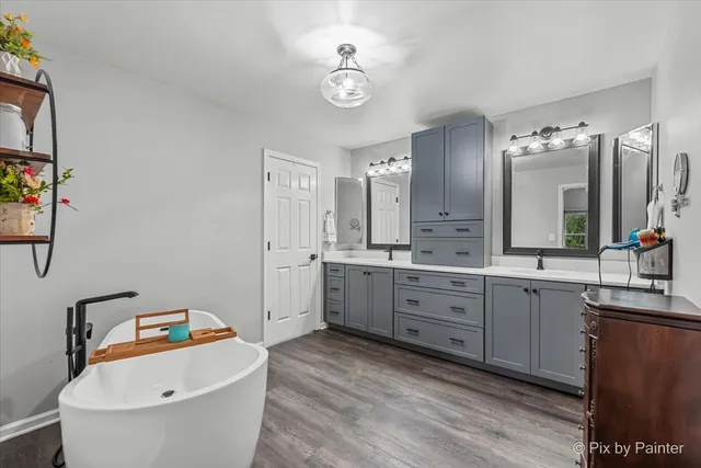 a view of a livingroom with furniture and a window