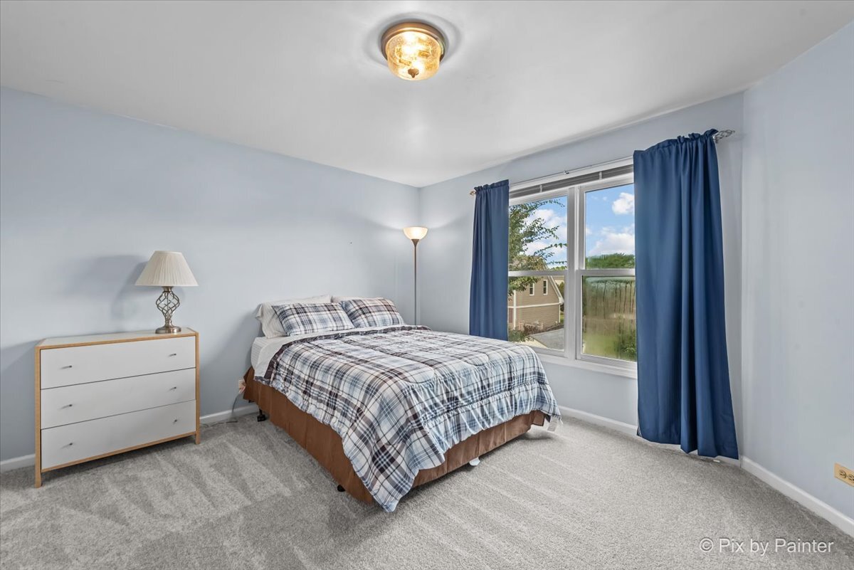 1820 Crofton Drive Algonquin, IL 60102 - Photo 33 of 60 a bedroom with a bed and a window