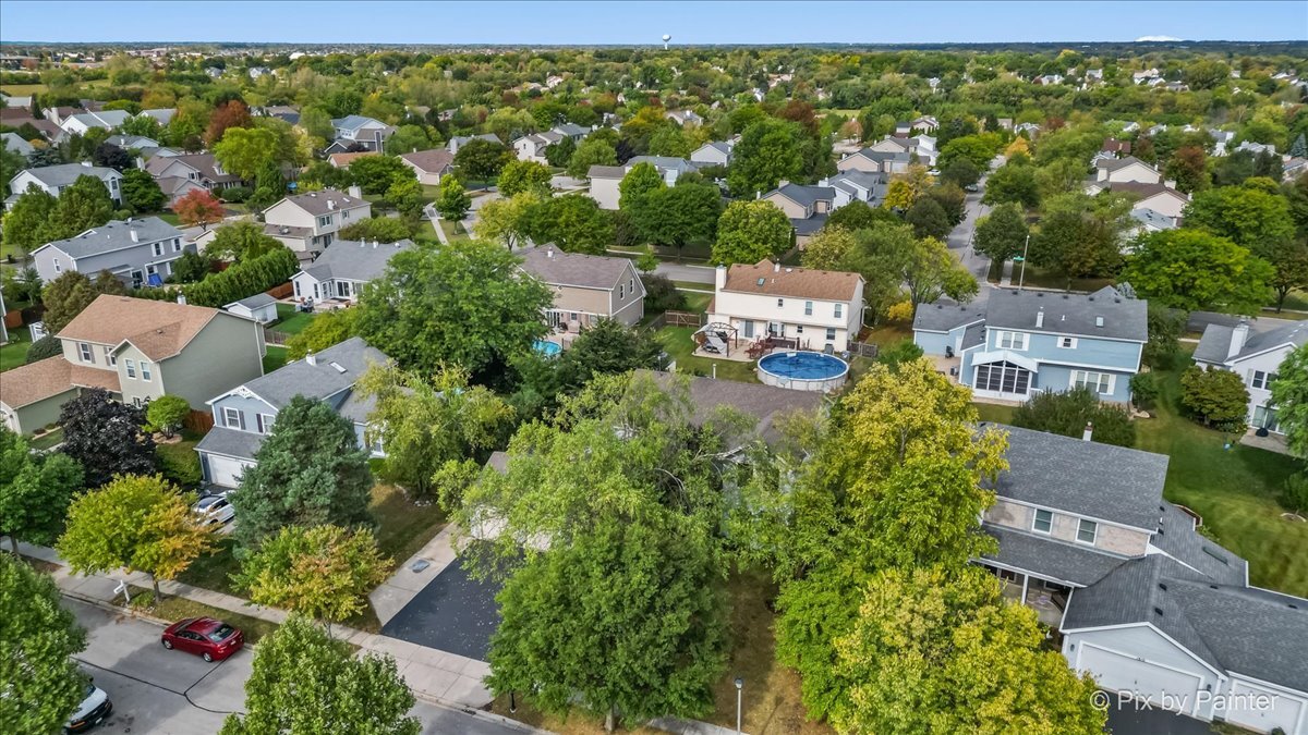 1820 Crofton Drive Algonquin, IL 60102 - Photo 49 of 60 an aerial view of residential house with outdoor space and trees all around