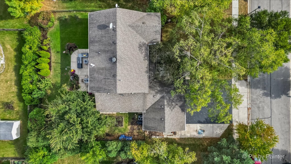 1820 Crofton Drive Algonquin, IL 60102 - Photo 7 of 60 an aerial view of a house with a yard and tree s