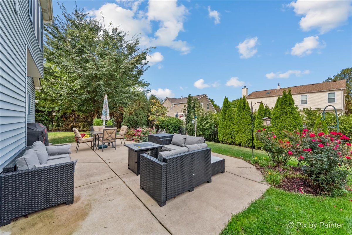 1820 Crofton Drive Algonquin, IL 60102 - Photo 9 of 60 a view of a patio with couches and potted plants