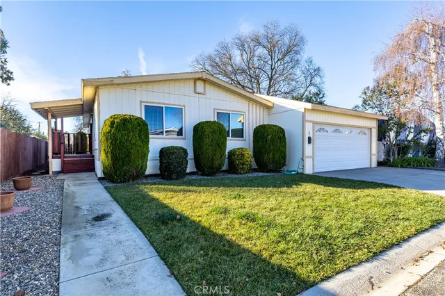 a view of a back yard with a house