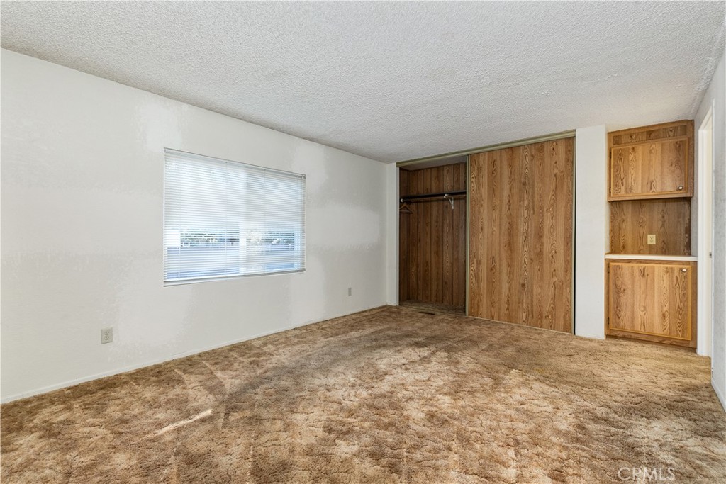 1220 Bennett Way, Unit 1 Templeton, CA 93465 - Photo 25 of 37 a view of an empty room with a window