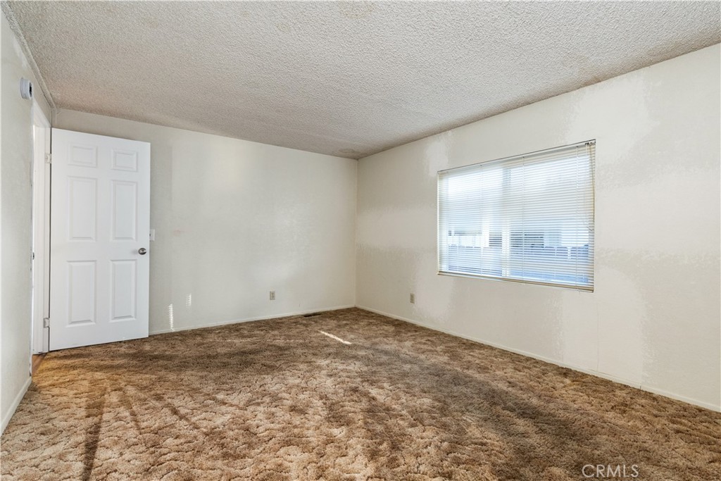 1220 Bennett Way, Unit 1 Templeton, CA 93465 - Photo 27 of 37 an empty room with a window