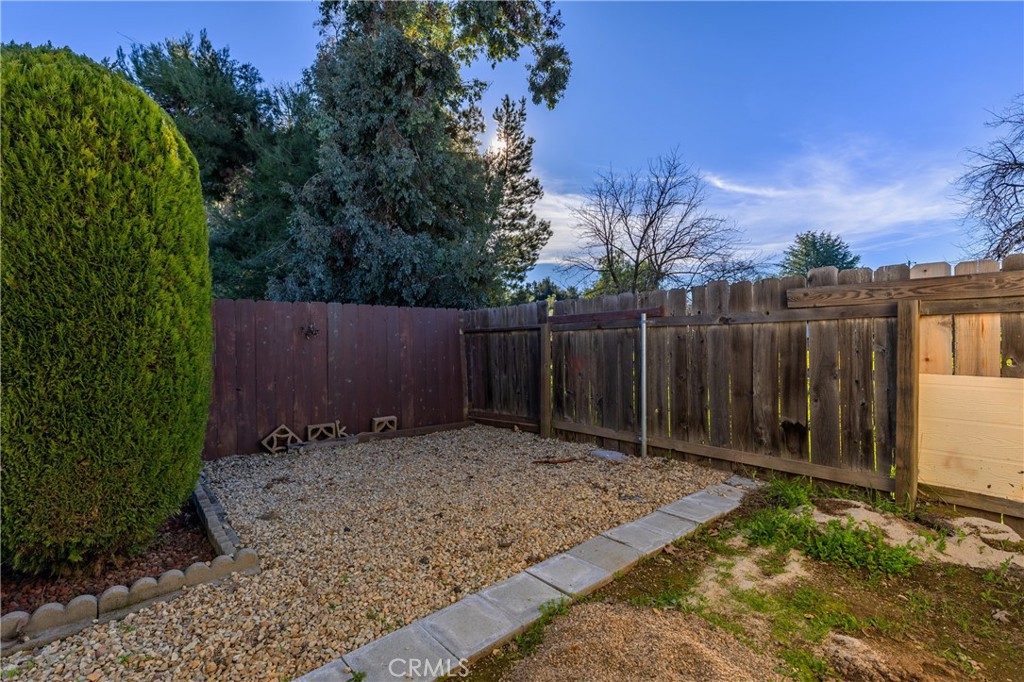 1220 Bennett Way, Unit 1 Templeton, CA 93465 - Photo 36 of 37 a view of garden with wooden fence