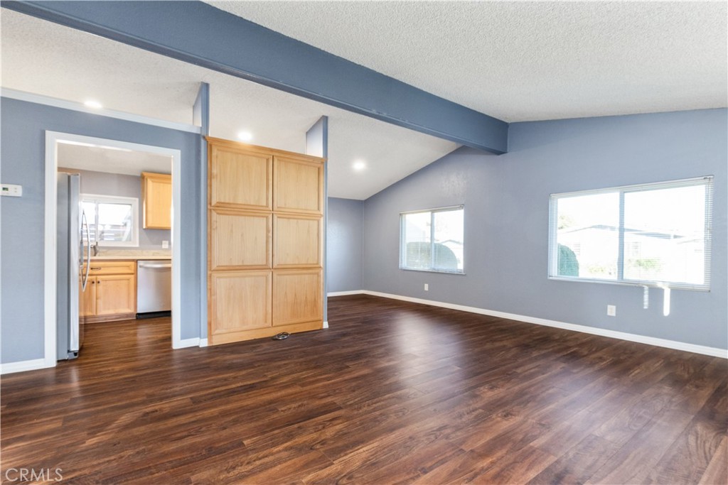 1220 Bennett Way, Unit 1 Templeton, CA 93465 - Photo 5 of 37 an empty room with wooden floor and windows