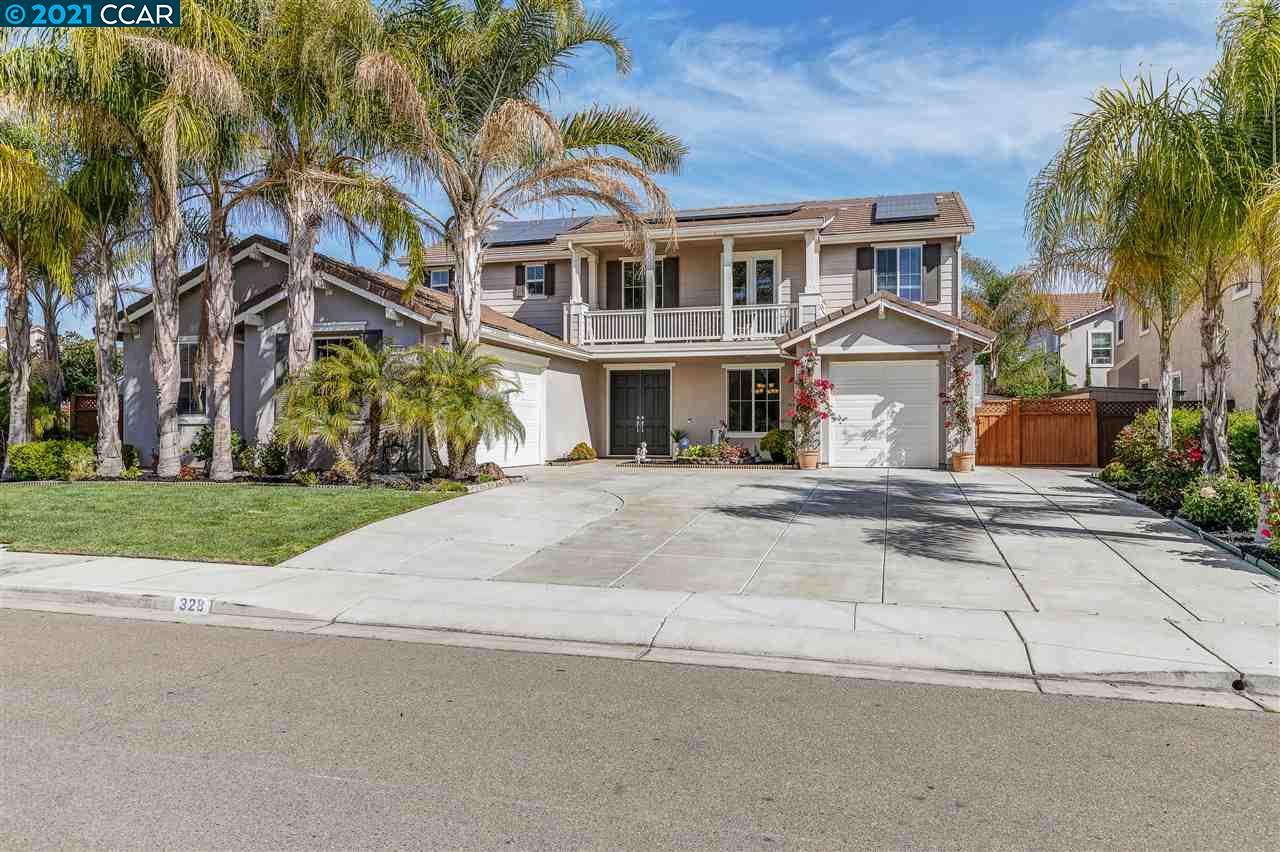 front view of a building with a yard