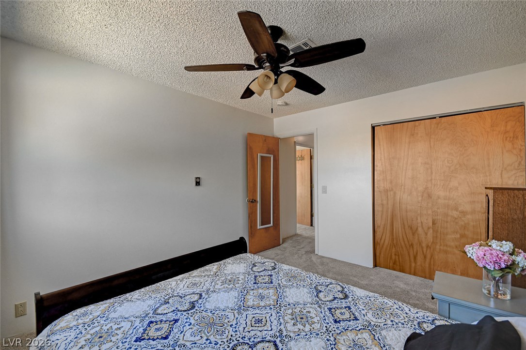 1920 Bowman Road Logandale, NV 89021 - Photo 42 of 68 Smooth plaster walls and neutral carpeting define this quiet sleeping space.